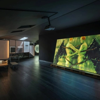 Digital art video depicting people in the PinchukArtCentre hall