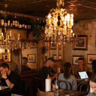 Cozy dining area at Mimosa Brooklyn Pizza restaurant in Kyiv with vintage decor