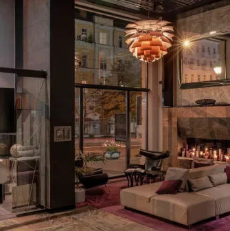 Stylish lobby of 11 Mirrors Design Hotel in Kyiv with designer furniture