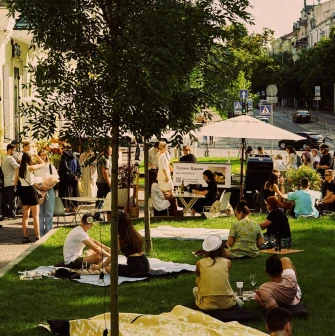 Pure Naive - outdoor terrace seating area with tables