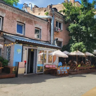 OG Burger in Kyiv - brick building and outdoor terrace