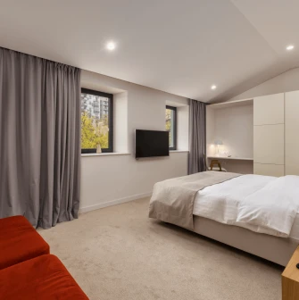 Sophia Hotel - luxurious hotel room with a chandelier and refined furnishings