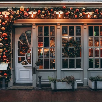 Resraurant Under Wonder - festive restaurant entrance adorned with elaborate holiday and new year decorations