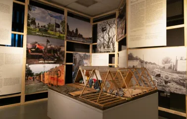 Muzei Istorii Mista Kyieva in Kyiv - exhibition installation with wooden structures and photos documenting a historical tent camp protest