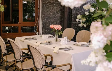 Etre Sofie - luxurious dining area with plush seating and warm, refined decor