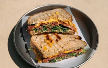 One Tea Tree - grilled sandwich with cheese, meat and greens