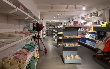 Vsi Svoi store in Kyiv - interior with shelves of Ukrainian ceramics, tableware and home decor
