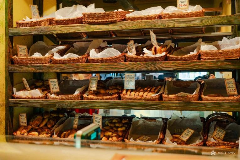 Yaroslava pastry in Kyiv - shelves with freshly baked pies and pastries inside the bakery