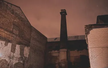 Exterior of K41 club in Kyiv: old brick building at night