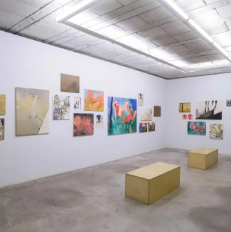 Painting exhibition on walls at Ya Gallery in Kyiv