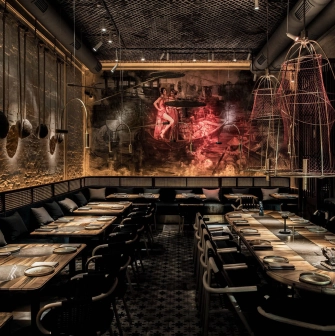 The picturesque wall interior of the NĂM restaurant in Kyiv