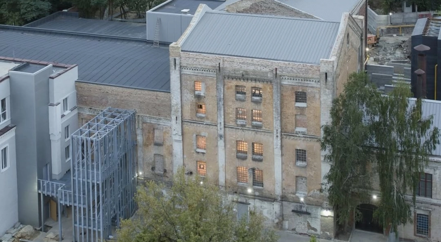 k41 - aerial view of the renovated historic brick industrial building complex and courtyard