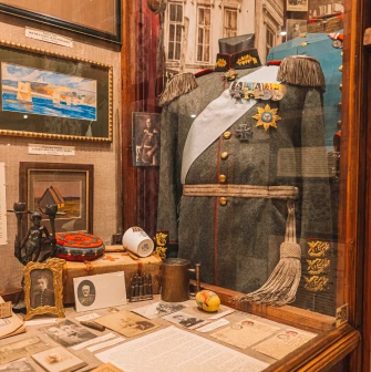 One Street Museum in Kyiv - showcase with historical uniform and medals
