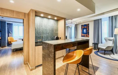 Modern room at the Radisson Blu Hotel in the center of Kyiv with double bed and designer furniture