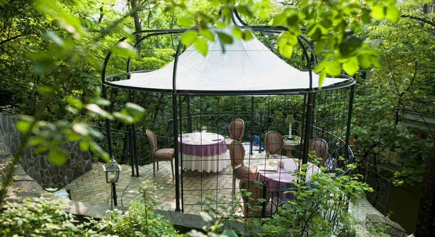 Terasa - wide wooden outdoor terrace area with views and seating