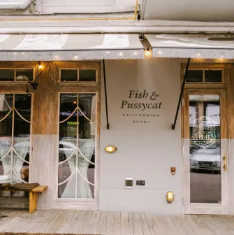 Fish Pussycat - restaurant facade featuring large windows and clear exterior branding