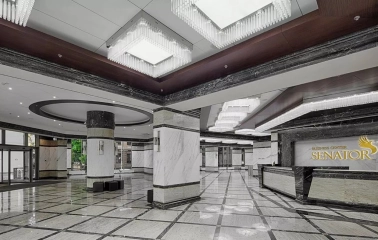 Senator Business Center in Kyiv - marble lobby hall with large square chandeliers