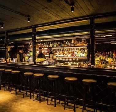Bar counter with drinks at Hendrick's Bar in Kyiv