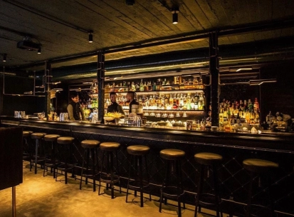 Bar counter with drinks at Hendrick's Bar in Kyiv