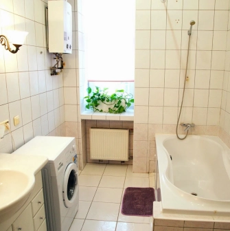 Kashtan Guest House - clean bathroom with shower and white tiles