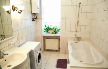 Kashtan Guest House - clean bathroom with shower and white tiles