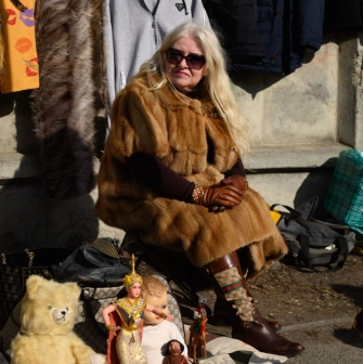 Selling vintage toys and clothes at a flea market near Pochayna in Kyiv