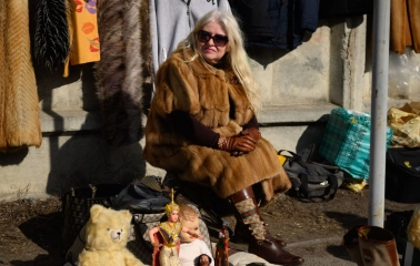Selling vintage toys and clothes at a flea market near Pochayna in Kyiv