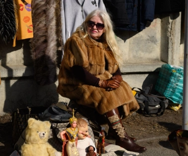 Selling vintage toys and clothes at a flea market near Pochayna in Kyiv