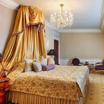 InterContinental - king-sized bed in a premium hotel room with lavish linens