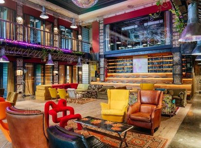 Bright lounge with colored chairs in the interior of Generator in Kyiv