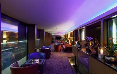 B-hush is a stylish seating area with soft seats, plants and a TV