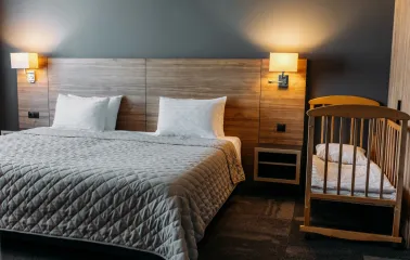 Double room in the Favor Park Hotel in Kyiv with wooden decoration