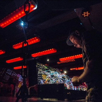 Stage with LED lighting during a performance at Closer Club