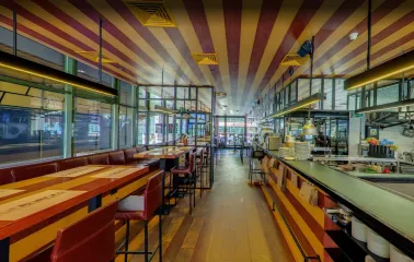 The Burger - contemporary restaurant interior featuring geometric lighting fixtures and set tables