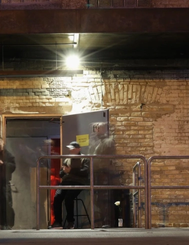 k41 - entrance to the club with guards and a sign "No photography allowed"