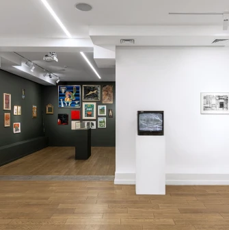 Wall with works of different genres at Voloshyn Gallery in Kyiv