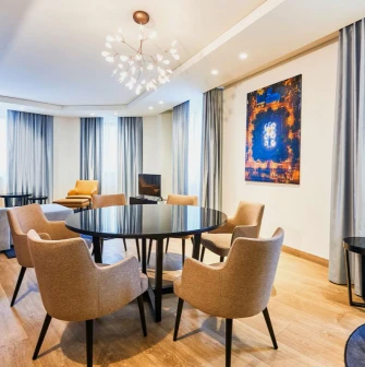 Radisson Blu - contemporary hotel room with large windows and a work desk