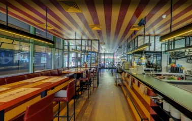 The Burger - contemporary restaurant interior featuring geometric lighting fixtures and set tables