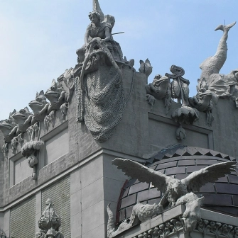 Budynok Horodetskoho in Kyiv - roof statues of mermaids with nets and giant frogs