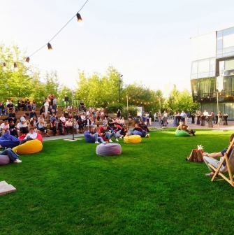 UNIT.City - modern outdoor terrace space with tiered seating and planters