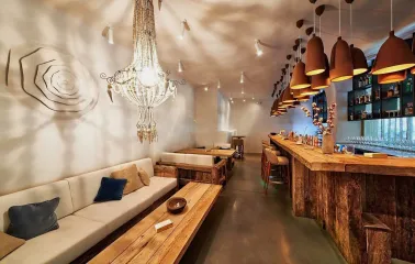 SHO - ground floor dining area showcasing the long main bar and serving counter