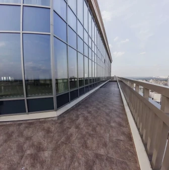 Senator Business Center in Kyiv - long terrace with glass facade and city panorama