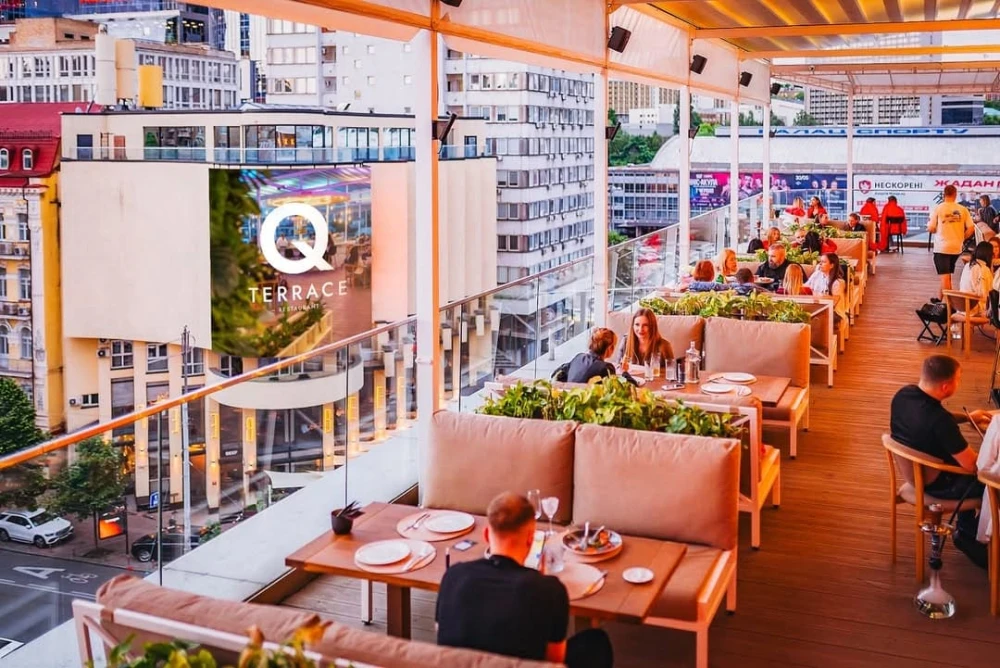 Outdoor terrace of the Q Terrace restaurant overlooking the center of Kyiv