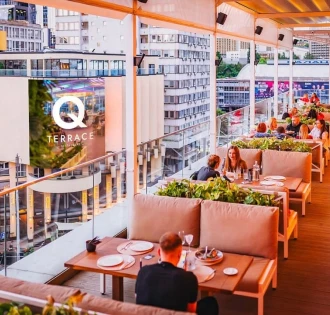 Outdoor terrace of the Q Terrace restaurant overlooking the center of Kyiv