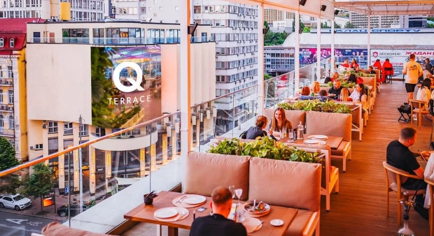 Outdoor terrace of the Q Terrace restaurant overlooking the center of Kyiv