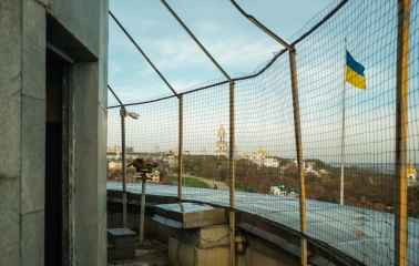 Motherland - view of Kyiv through the observation deck grid