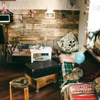 A cozy corner with vintage-style furniture inside Vagabond Cafe in Podil, Kyiv