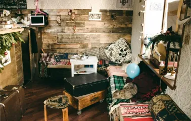 A cozy corner with vintage-style furniture inside Vagabond Cafe in Podil, Kyiv