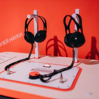 Interactive audio exhibit with headphones at the Museum of Science