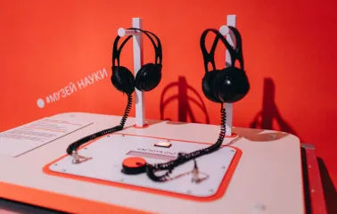 Interactive audio exhibit with headphones at the Museum of Science